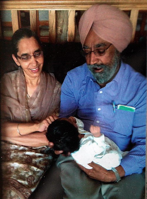PHIL HOSSACK / WINNIPEG FREE PRESS Darshan and Mohinder Singh with a newborn grandson in happier days. Family photo. See Randy Turner Story. - April 4, 2016