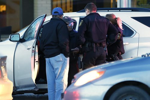 JOHN WOODS / WINNIPEG FREE PRESS Police attend to an incident on Pembina at McGillivray Blvd Monday, April 4, 2016.