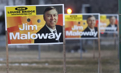 WAYNE GLOWACKI / WINNIPEG FREE PRESS  NDP candidate Jim Maloway's Manitoba Election signs along Henderson Highway Tuesday. Kristin Annable  story  April 5  2016