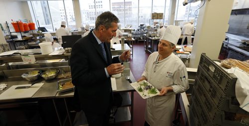 WAYNE GLOWACKI / WINNIPEG FREE PRESS  Progressive Conservative Leader Brian Pallister speaks to Red River College School of Hospitality and Culinary Arts Instructor Warren Pendree  (right) on his tour of the downtown campus  Tuesday.   For  Bart Kives behind the scenes story  April 5  2016