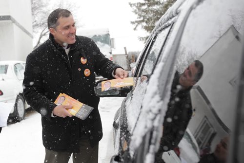 RUTH BONNEVILLE / WINNIPEG FREE PRESS  NDP candidate Joe McKellep talks to residents on Lake Ridge Road  in Assiniboia Tuesday.      April 05, 2016