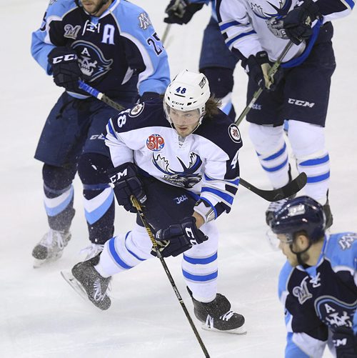 PHIL HOSSACK / WINNIPEG FREE PRESS Brendan Lemieux got right into the thick of things in his Manitoba moose debut Tuesday evening. See story. April 5, 2016