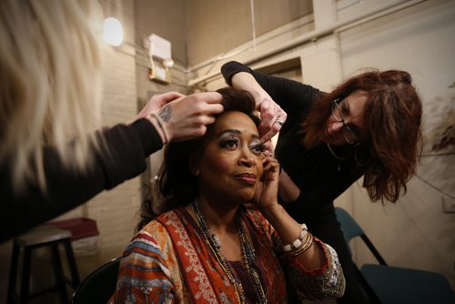 JOHN WOODS / WINNIPEG FREE PRESS Jennifer Leigh Warren, blues singer, gets a fine tuning on her wig by stylists Judi Olson Chiswell (R) and Mazena Puksto backstage prior to hitting the stage in A Night With Janis Joplin in Winnipeg Tuesday, April 5, 2016.