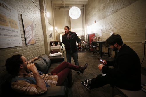 JOHN WOODS / WINNIPEG FREE PRESS Neil Johnson (from left), saxophone player, Matthew Owens, trumpet player and Jonathan Uda, show promoter, joke around with each other  backstage prior to hitting the stage in A Night With Janis Joplin in Winnipeg Tuesday, April 5, 2016.