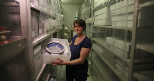 RUTH BONNEVILLE / WINNIPEG FREE PRESS  Andrea Reichert, curator of the Manitoba Crafts Museum and Library on Kennedy holds a bowl created by Janice Howorth that is just one of the hundreds of items being packed up and moved to a new location near the Exchange District.   See Alan Small's story.    April 06, 2016