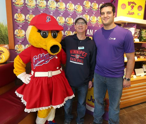 JASON HALSTEAD / WINNIPEG FREE PRESS  L-R: Winnipeg Goldeyes mascot Goldette, Goldeyes general manager Andrew Collier and Armando Versace, marketing and lotteries manager for the Society for Manitobans with Disabilities/Easter Seals Manitoba, were at the Pembina and Grant Booster Juice on March 11, 2016, as part of 'We All Have Ability Day.' Booster Juice had local media and sport personalities serve smoothies and donated one dollar from each smoothie sold to the SMD/Easter Seals Manitoba. (See Social Page)