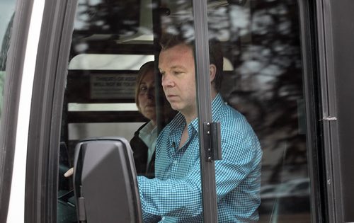 PHIL HOSSACK / WINNIPEG FREE PRESS Geoff Kirbyson drives into a transit obstacle course for prospective bus drivers in a city transit bus Wednesday, while Transit's Driving Instructor Denise Aston-Devisscher looks on. See his story. April  6, 2016