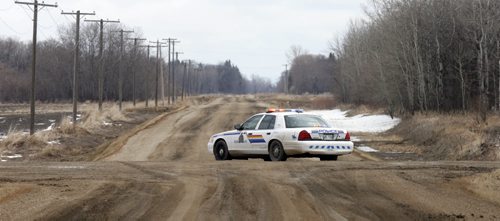 WAYNE GLOWACKI / WINNIPEG FREE PRESS  RCMP block access on 64 Rd. North that leads into the Dakota Tipi First Nation Thursday after early morning shooting. Bill Redekop story   April 7  2016