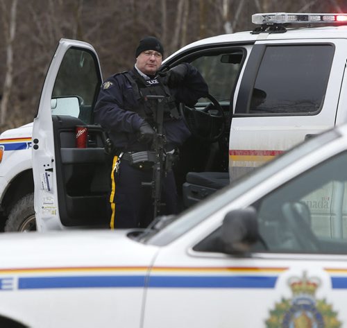 WAYNE GLOWACKI / WINNIPEG FREE PRESS  RCMP block access on the road that leads into the Dakota Tipi First Nation Thursday after an early morning shooting. Bill Redekop story   April 7  2016