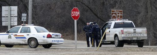 WAYNE GLOWACKI / WINNIPEG FREE PRESS  RCMP block access on the road that leads into the Dakota Tipi First Nation Thursday after an early morning shooting. Bill Redekop story   April 7  2016