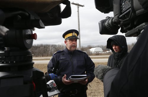 WAYNE GLOWACKI / WINNIPEG FREE PRESS  RCMP spokesman Sgt. Bert Paquet updates the media near the Dakota Tipi First Nation Thursday after an early morning shooting. Bill Redekop story   April 7  2016