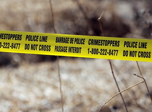 BORIS MINKEVICH / WINNIPEG FREE PRESS DAKOTA TIPI FIRST NATION, MB - RCMP are still at locations on the reserve where double shooting occurred early Thursday morning. RCMP police around house of shooting victim Chris Pashe. April 8, 2016