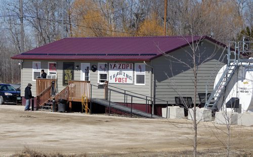 BORIS MINKEVICH / WINNIPEG FREE PRESS DAKOTA TIPI FIRST NATION, MB - RCMP are still at locations on the reserve where double shooting occurred early Thursday morning. This is the Yazopi Trading Post which caught some of the video of the victim and shooter. April 8, 2016