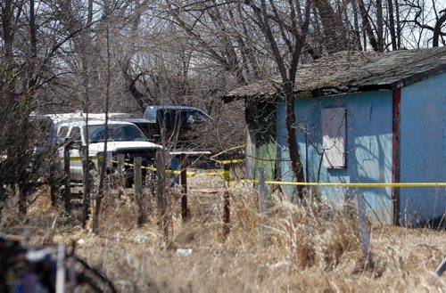 BORIS MINKEVICH / WINNIPEG FREE PRESS DAKOTA TIPI FIRST NATION, MB - RCMP are still at locations on the reserve where double shooting occurred early Thursday morning. RCMP on scene of house of shooting victim Chris Pashe. April 8, 2016