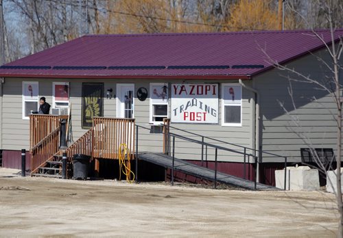 BORIS MINKEVICH / WINNIPEG FREE PRESS DAKOTA TIPI FIRST NATION, MB - RCMP are still at locations on the reserve where double shooting occurred early Thursday morning. This is the Yazopi Trading Post which caught some of the video of the victim and shooter. April 8, 2016