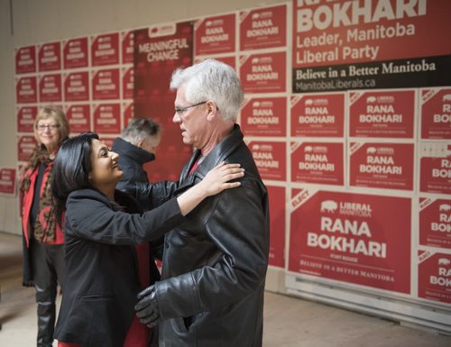 DAVID LIPNOWSKI / WINNIPEG FREE PRESS   Manitoba Liberal Party leader Rana Bokhari greets Federal Minister Jim Carr as she speaks to volunteers at her campaign headquarters on Osbourne Saturday morning prior to heading out to go door knocking on the first day of advance voting April 9, 2016.