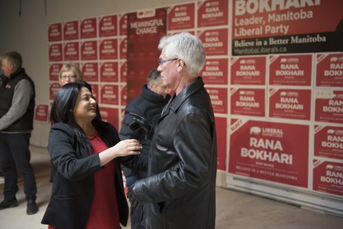 DAVID LIPNOWSKI / WINNIPEG FREE PRESS   Manitoba Liberal Party leader Rana Bokhari greets Federal Minister Jim Carr as she speaks to volunteers at her campaign headquarters on Osbourne Saturday morning prior to heading out to go door knocking on the first day of advance voting April 9, 2016.