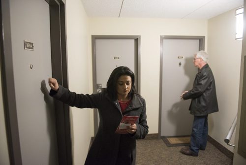 DAVID LIPNOWSKI / WINNIPEG FREE PRESS   Manitoba Liberal Party leader Rana Bokhari and Federal Minister Jim Carr door knocking on the first day of advance voting Saturday April 9, 2016 in an apartment building on Wellington Crescent.