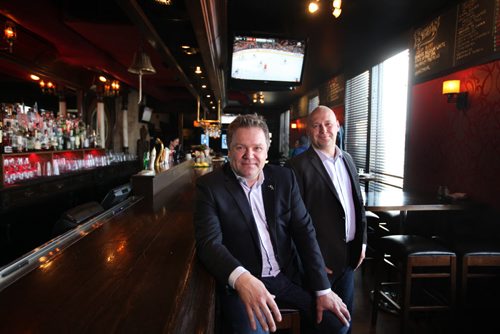 RUTH BONNEVILLE / WINNIPEG FREE PRESS  Biz, The Round Table, a long-serving neighbourhood restaurant on Pembina Hwy to get complete makeover in coming months.  Portrait of Kristjan Kristjansson (left) and Kris Kopansky (right, standing) heading up the changes. See Geoff Kirbyson's story.   April 09, 2016