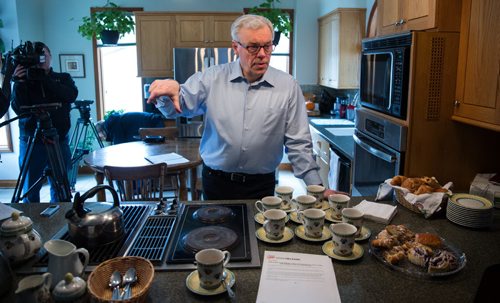 MIKE DEAL / WINNIPEG FREE PRESS NDP leader Greg Selinger chats with media after inviting them into his house to make available his 2014 tax return.  160410 - Sunday, April 10, 2016