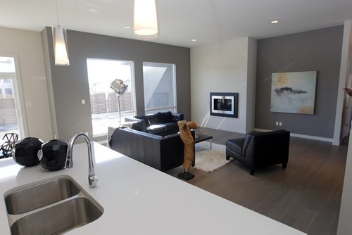 BORIS MINKEVICH / WINNIPEG FREE PRESS New Homes -7 Wheelwright Way in Oak Bluff West. View from kitchen looking onto living room. Artista Homes. April 11, 2016 -30-