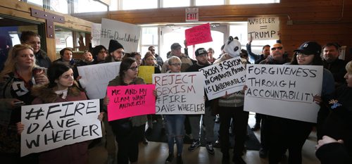 WAYNE GLOWACKI / WINNIPEG FREE PRESS   About 60 protested outside the CITI FM studio Tuesday afternoon in the Osborne Village calling for the host Dave Wheeler's termination in response to the racist and sexist videos posted. Dave Wheeler was suspended by the station Tuesday morning.  April 12  2016