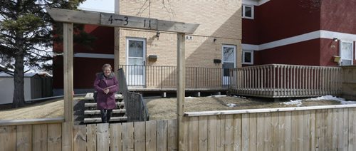 WAYNE GLOWACKI / WINNIPEG FREE PRESS     NDP candidate Melanie Wight for Burrows riding visits homes in the housing complex along Dorset St. in Winnipeg Tuesday.  Nick Martin story April 12  2016