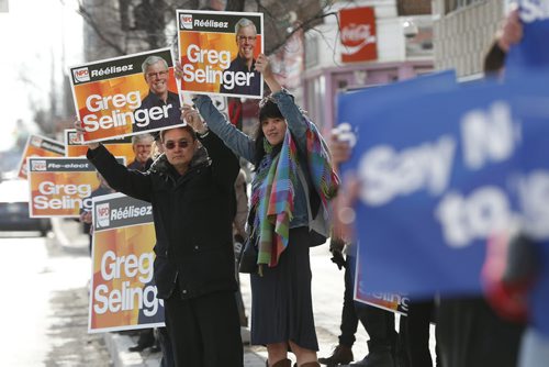 JOHN WOODS / WINNIPEG FREE PRESS NDP and PC party supporters gather outside as Manitoba party leaders Greg Selinger (NDP), Rana Bokhari (Liberal), James Beddome (Green Party) and  Brian Pallister (PC) take part in a CBC/CTV debate at CBC in Winnipeg Tuesday, April 12, 2016.