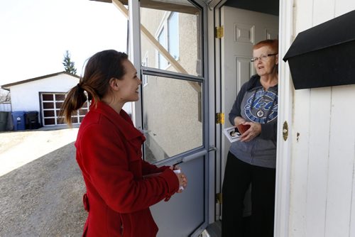 WAYNE GLOWACKI / WINNIPEG FREE PRESS   Election Profile.   At left, Liberal candidate Cindy Lamoureux in her Burrows riding Wednesday talks to Pat Kerr at her home on Bondar Bay. Nick Martin story  April 13  2016