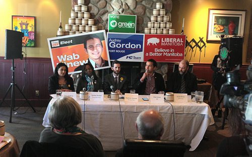 PHIL HOSSACK / WINNIPEG FREE PRESS Left to right; Rana Bokhari - Lib, Audrey Gordon - PC, Matthew Ostrove - Manitoba Party, Wab Kinew - NDP, Grant Sharp - Green  faced off in front of fort Rouge / Osborne Village residents who packed Buccacino's Fresca Italiana in Osborne Village Wednesday afternoon to hear the slate of candidates. See Geoff Kirbyson's story.  APRIL 13, 2016