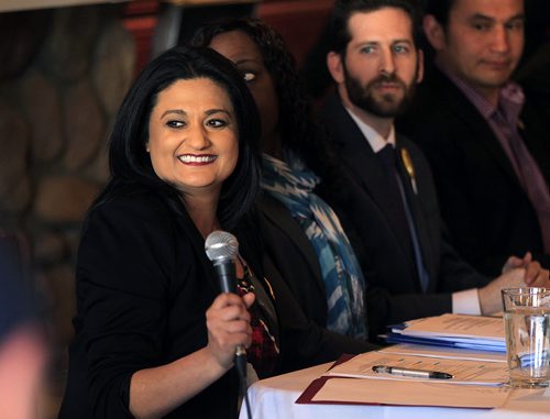PHIL HOSSACK / WINNIPEG FREE PRESS Rana Bokhari - Lib, in front of fort Rouge / Osborne Village residents who packed Buccacino's Fresca Italiana in Osborne Village Wednesday afternoon to hear the slate of candidates. See Geoff Kirbyson's story.  APRIL 13, 2016