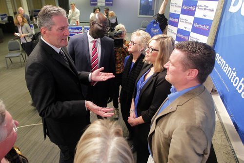 BORIS MINKEVICH / WINNIPEG FREE PRESS Progressive Conservatives Commit to Better Services. Progressive Conservative Leader Brian Pallister outlines Better Services Plan at 130 Marion Street, Winnipeg Campaign Office for PC Candidate for St. Boniface, Mamadou Ka.  He also had lots of questions about Costa Rica. Here he talks to other candidates that backed him at the event right after it was done. April 15, 2016
