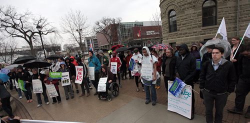 PHIL HOSSACK / WINNIPEG FREE PRESS Rallyer's gather tin support of a $15 minimum wage at the Univercity of Winnipeg Friday at noon before marching down Portage ave.  See story. APRIL 15, 2016