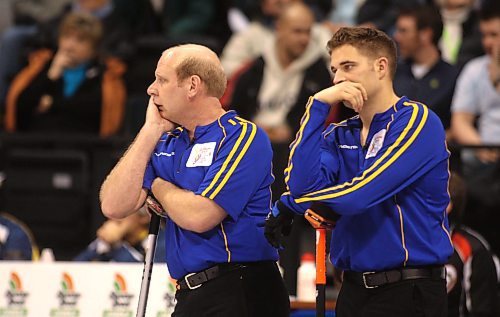 BORIS MINKEVICH/WINNIPEG FREE PRESS  080313 Team Alberta's Kevin Martin&#xa4;and John Morris look bored.