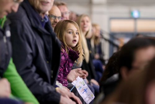 RUTH BONNEVILLE / WINNIPEG FREE PRESS  Six-year-old Grayson Plett cheers on her dad, Tim Plett, with her mom (Nicole Plett), in the stands at the Allen Cup tournament in Steinbach Mb. Friday night.    See Jeff Hamilton's story.  April 15, 2016