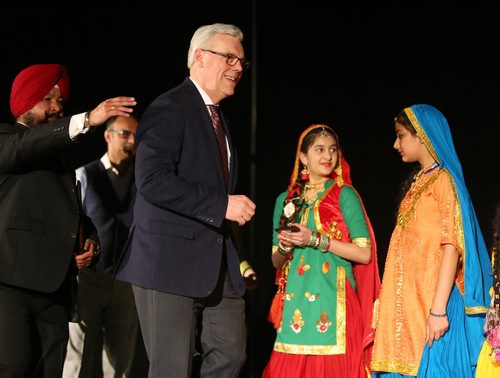 JASON HALSTEAD / WINNIPEG FREE PRESS  Premier Greg Selinger congratulates members of the AEW Girls Punjabi dance group at the Vaisakhi Mela celebration at the Punjab Cultural Centre on April 16, 2016.