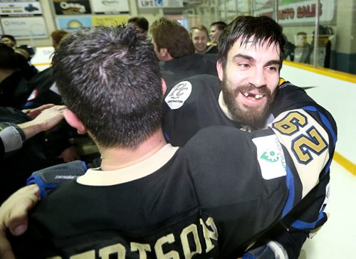 TREVOR HAGAN / WINNIPEG FREE PRESS Bentley Generals Sean Robertson (29) and Adam Huxley (71) celebrate winning the 2016 Allan Cup in Steinbach after defeating the Southeast Prairie Thunder in overtime, Saturday, April 16, 2016.