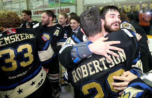 TREVOR HAGAN / WINNIPEG FREE PRESS Bentley Generals Sean Robertson (29) and Adam Huxley (71) celebrate winning the 2016 Allan Cup in Steinbach after defeating the Southeast Prairie Thunder in overtime, Saturday, April 16, 2016.