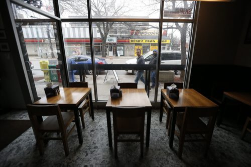 JOHN WOODS / WINNIPEG FREE PRESS The view from inside Sherbrooke Street Delicatessen in Winnipeg Sunday, April 17, 2016.