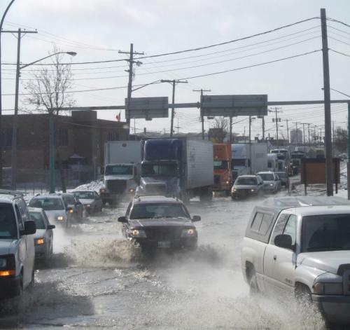 Water main break - Route 90 and Saskatchewan - acked up northbound traffic on Route 90 at Saskatchewan Avenue slowly makes it way through water from a watermain break just before noon today.  Gordon Sinclair - winnipeg free press