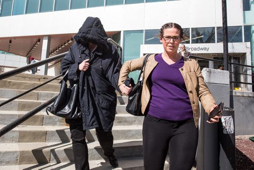 MIKE DEAL / WINNIPEG FREE PRESS Andrea Giesbrecht, 42, leaves court Monday afternoon after she appeared on six charges of concealing a child's body.  160418 - Monday, April 18, 2016