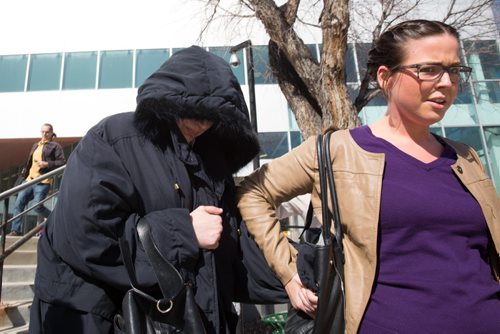 MIKE DEAL / WINNIPEG FREE PRESS Andrea Giesbrecht, 42, leaves court Monday afternoon after she appeared on six charges of concealing a child's body.  160418 - Monday, April 18, 2016