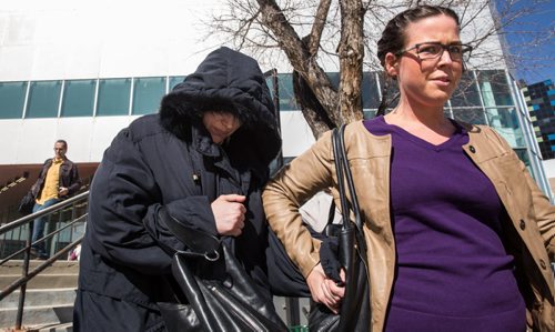 MIKE DEAL / WINNIPEG FREE PRESS Andrea Giesbrecht, 42, leaves court Monday afternoon after she appeared on six charges of concealing a child's body.  160418 - Monday, April 18, 2016