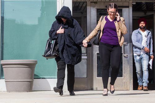 MIKE DEAL / WINNIPEG FREE PRESS Andrea Giesbrecht, 42, leaves court Monday afternoon after she appeared on six charges of concealing a child's body.  160418 - Monday, April 18, 2016