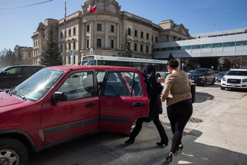 MIKE DEAL / WINNIPEG FREE PRESS Andrea Giesbrecht, 42, leaves court Monday afternoon after she appeared on six charges of concealing a child's body.  160418 - Monday, April 18, 2016