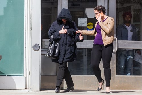 MIKE DEAL / WINNIPEG FREE PRESS Andrea Giesbrecht, 42, leaves court Monday afternoon after she appeared on six charges of concealing a child's body.  160418 - Monday, April 18, 2016