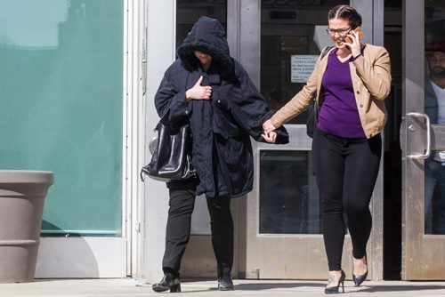 MIKE DEAL / WINNIPEG FREE PRESS Andrea Giesbrecht, 42, leaves court Monday afternoon after she appeared on six charges of concealing a child's body.  160418 - Monday, April 18, 2016