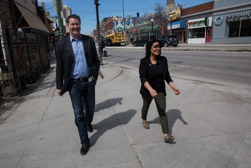 MIKE DEAL / WINNIPEG FREE PRESS Manitoba Liberal leader Rana Bokhari walks along Osborne Street Monday afternoon on her way to talk to the media at the intersection of River Ave and Osborne St. 160418 - Monday, April 18, 2016