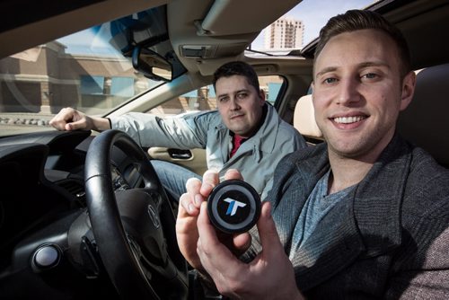 MIKE DEAL / WINNIPEG FREE PRESS Bryce North (right) and Dustin Refvik (left) have just raised $165,000 from a Kickstarter campaign for TrapTap, less than 8 months of conceiving of the idea. The device uses your smartphone's GPS and bluetooth communication to alert you to redlight camera intersections, school zone speed reductions and the presence of speed traps (though that depends on social input from other TrapTap users). 160418 - Monday, April 18, 2016