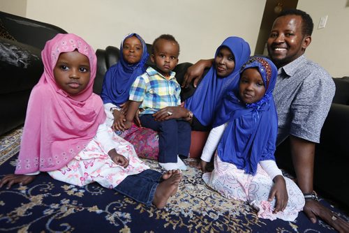 JOHN WOODS / WINNIPEG FREE PRESS Sahra Abdikarim Farah and Liibaan Ali with their children Bayaan (from left), Bushra, Bashaar and Bahja are photographed in their home Monday, April 18, 2016.